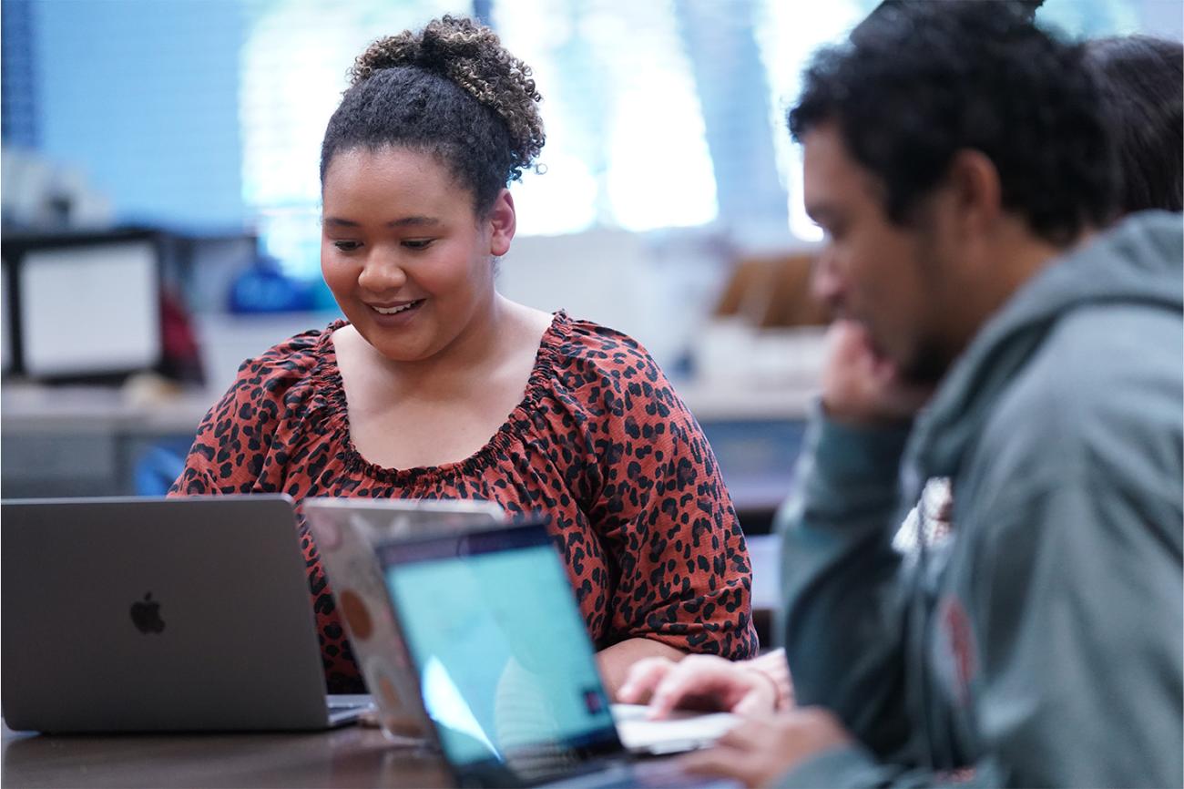 Two Students working on computers